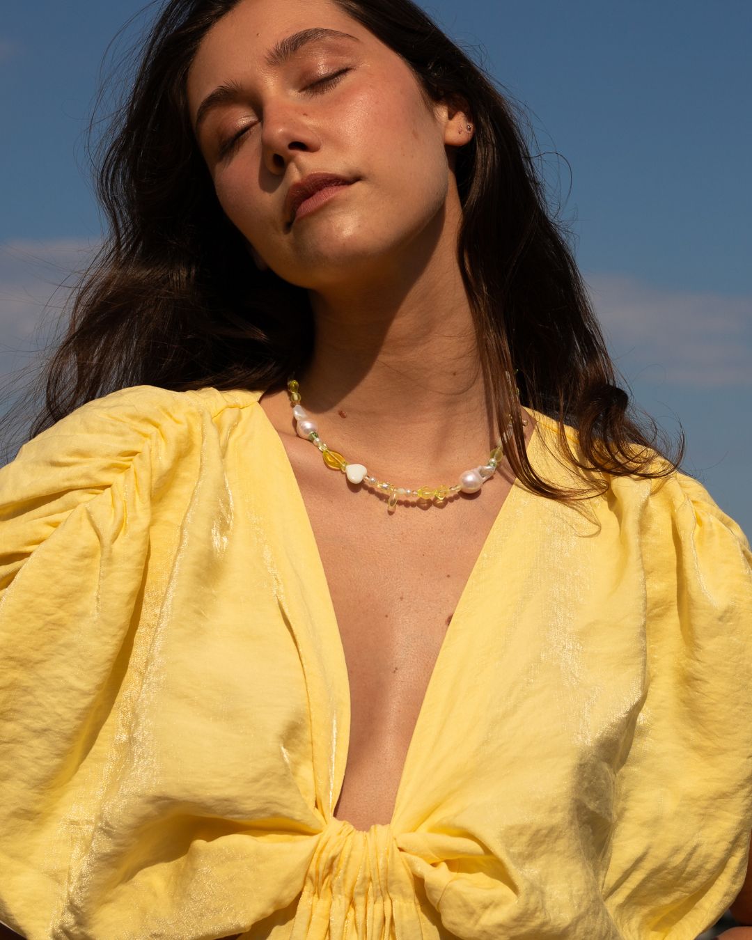 yellow butter glass beads and freshwater pearls necklace on model
