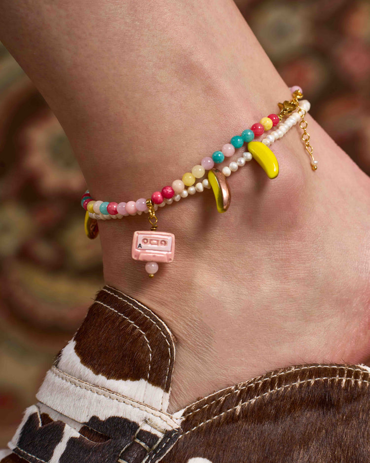 colourful jade and tape charm anklet on model