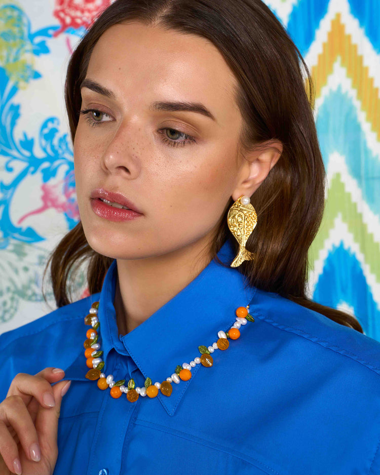 glass lemons and orange charms with pearls necklace on model